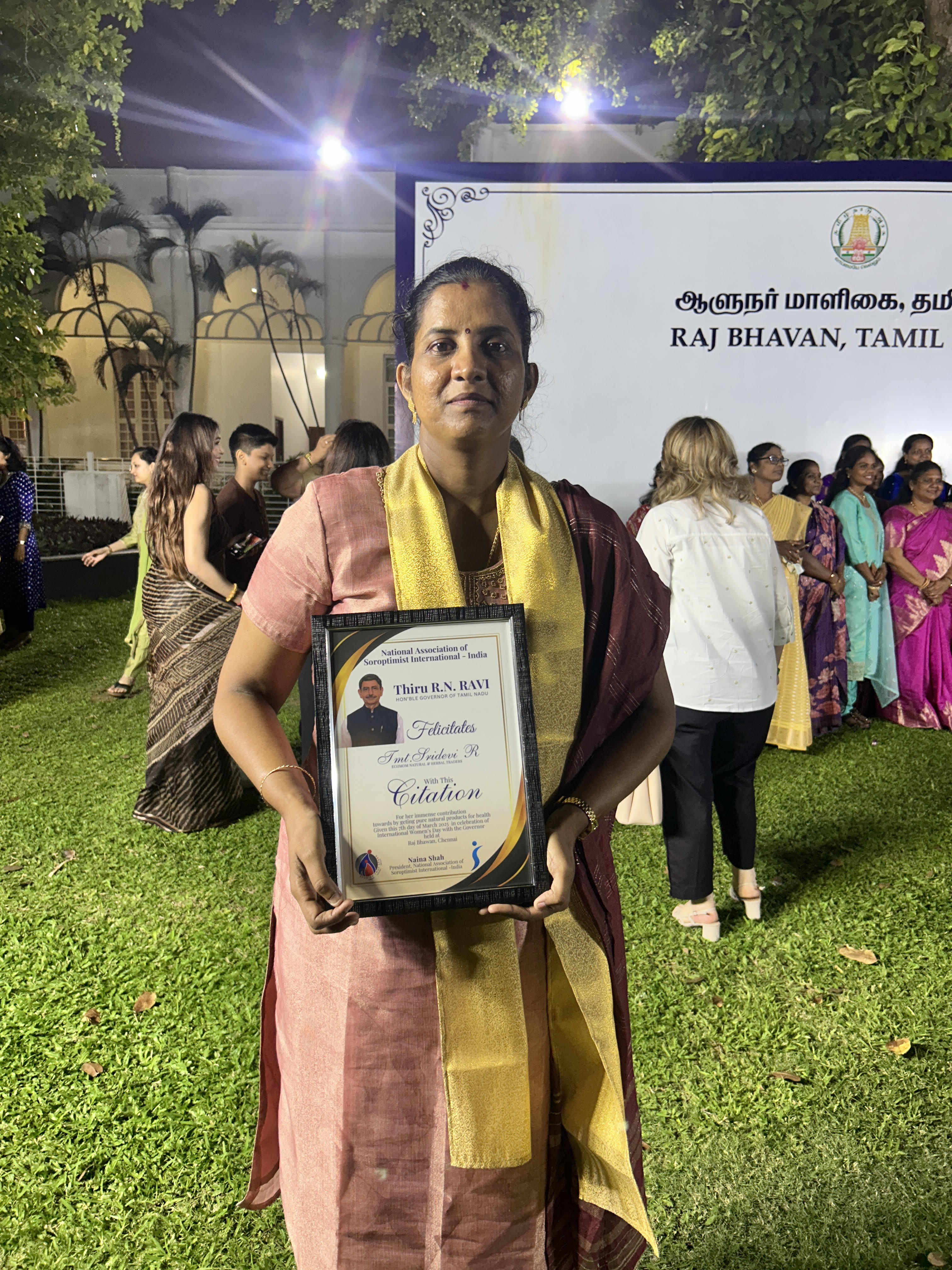 Founder receiving recognition for Ecomom Original Honey